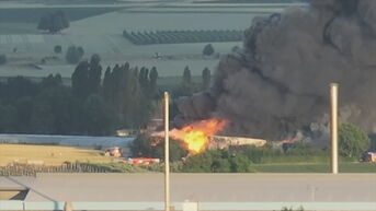 Dronebeelden tonen hoe zware brand loods in Bilzen verwoest