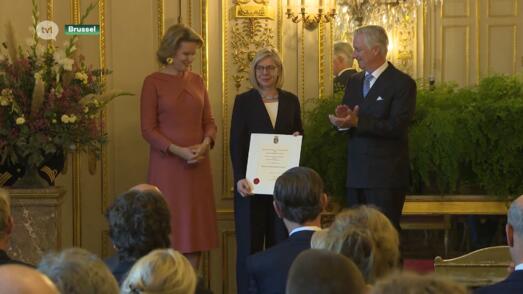 Porseleinkunstenaar Piet Stockmans en familie met grandeur ontvangen op het koninklijk paleis