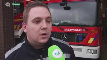 Brandweerman redt hond uit brandend huis
