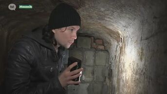 Filmmaker onderzoekt ondergronds gangenstelsel onder het centrum van Maaseik